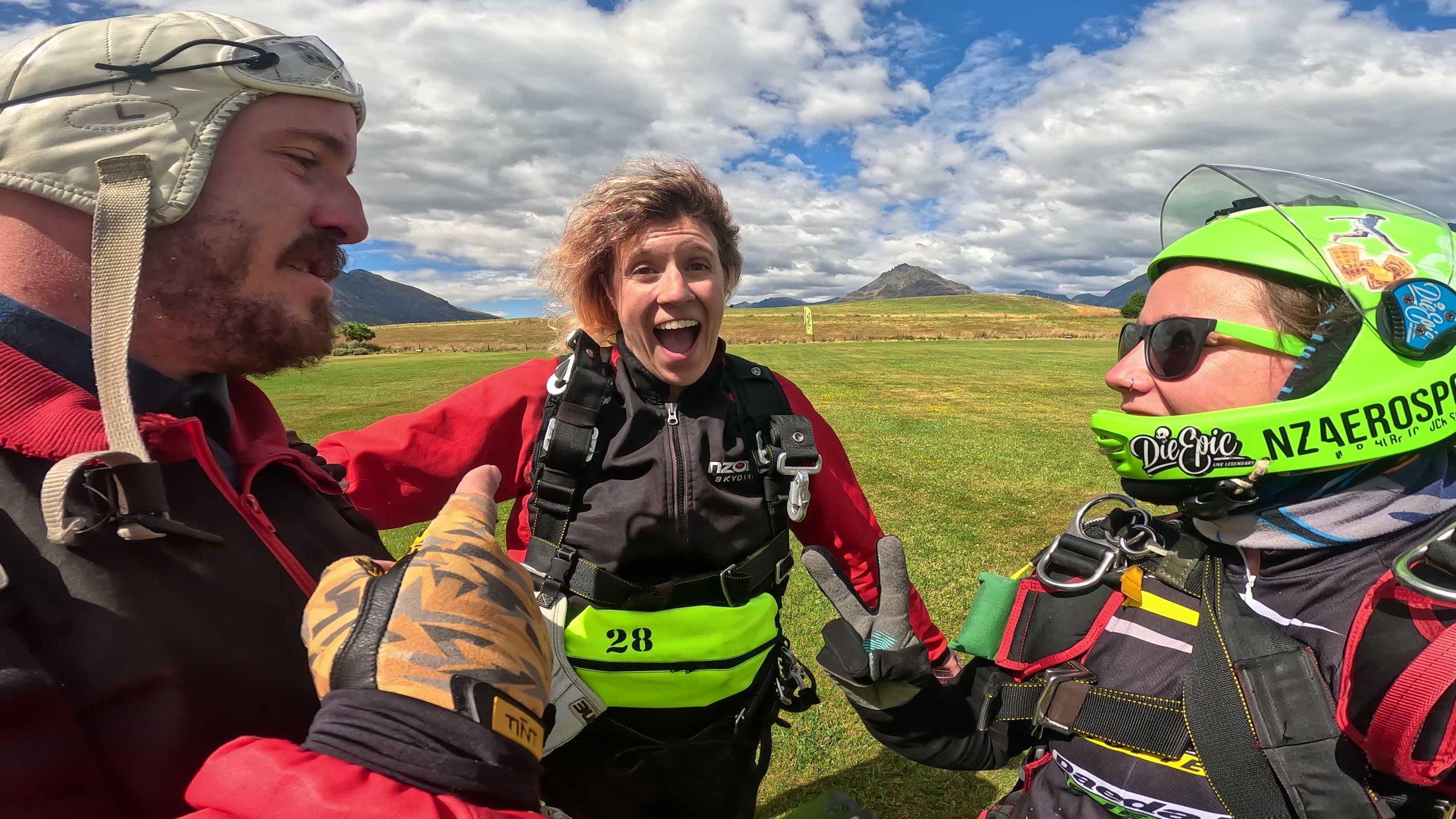 Joyful couple after skydiving in Queenstown, New Zealand