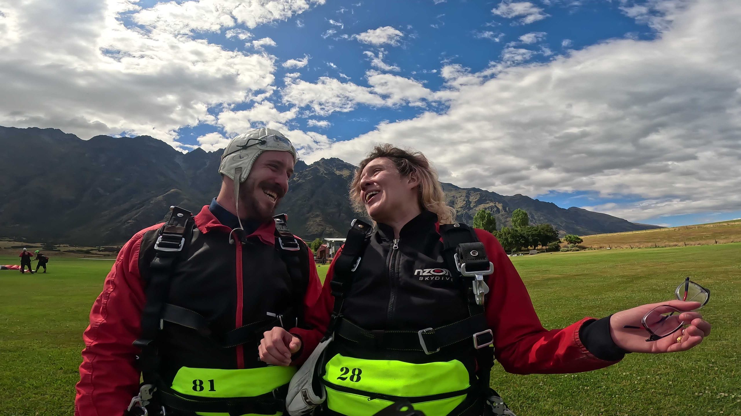 A couple after skydiving in Queenstown, New Zealand