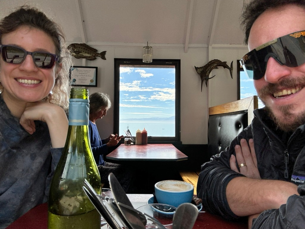 A couple enjoying their meal at The Craypot in Jackson Bay, New Zealand