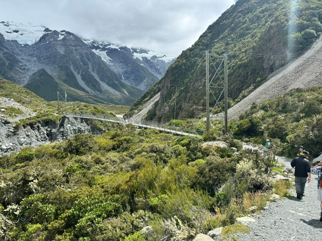 A suspension bridge on the Hooker Valley Track in New Zealand