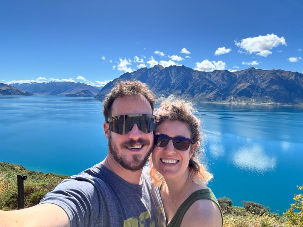 Couple in front of Lake Hawea in New Zealand