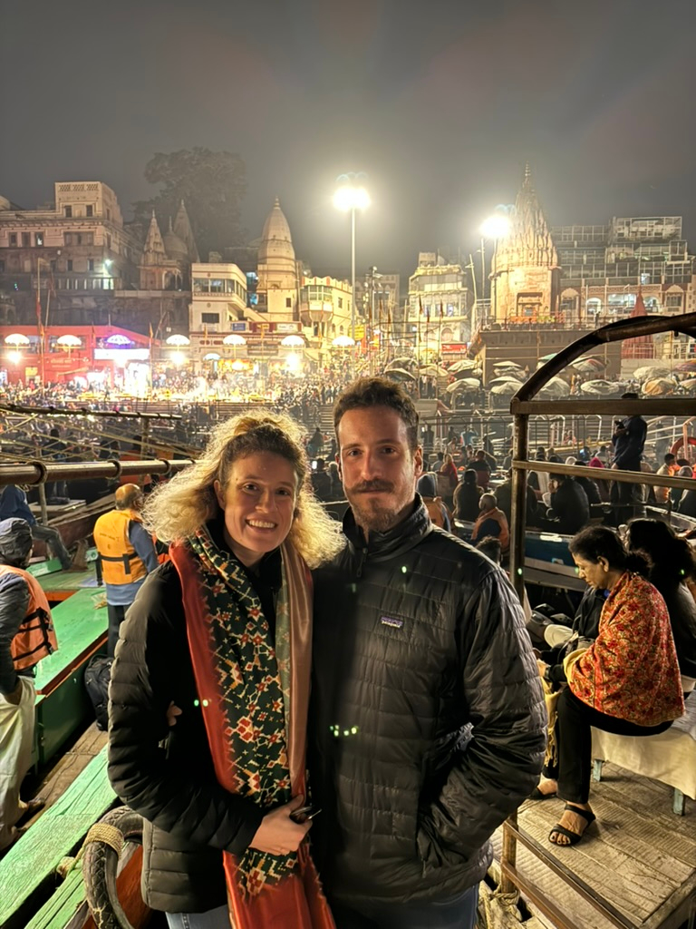 Couple at evening aarti at Dashashwamedh Ghat in Varanasi, India