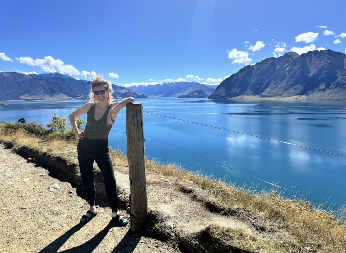 Woman in front of Lake Hawea in New Zealand