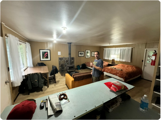 Man in cabin in Kokee State Park on Kauai, Hawaii, USA