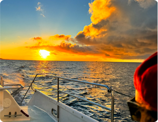 Sunrise on boat off of Kauai, Hawaii, USA