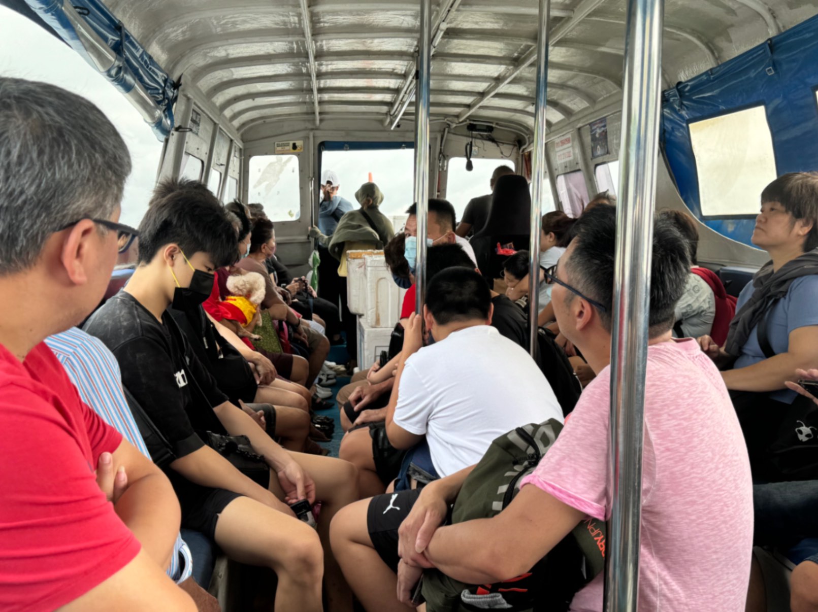 Crowded boat ride from Port Klang to Crab Island, Malaysia